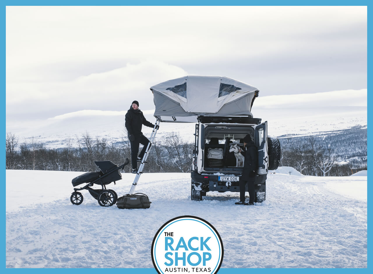 Overlanding rooftop tent mounted to roof rack